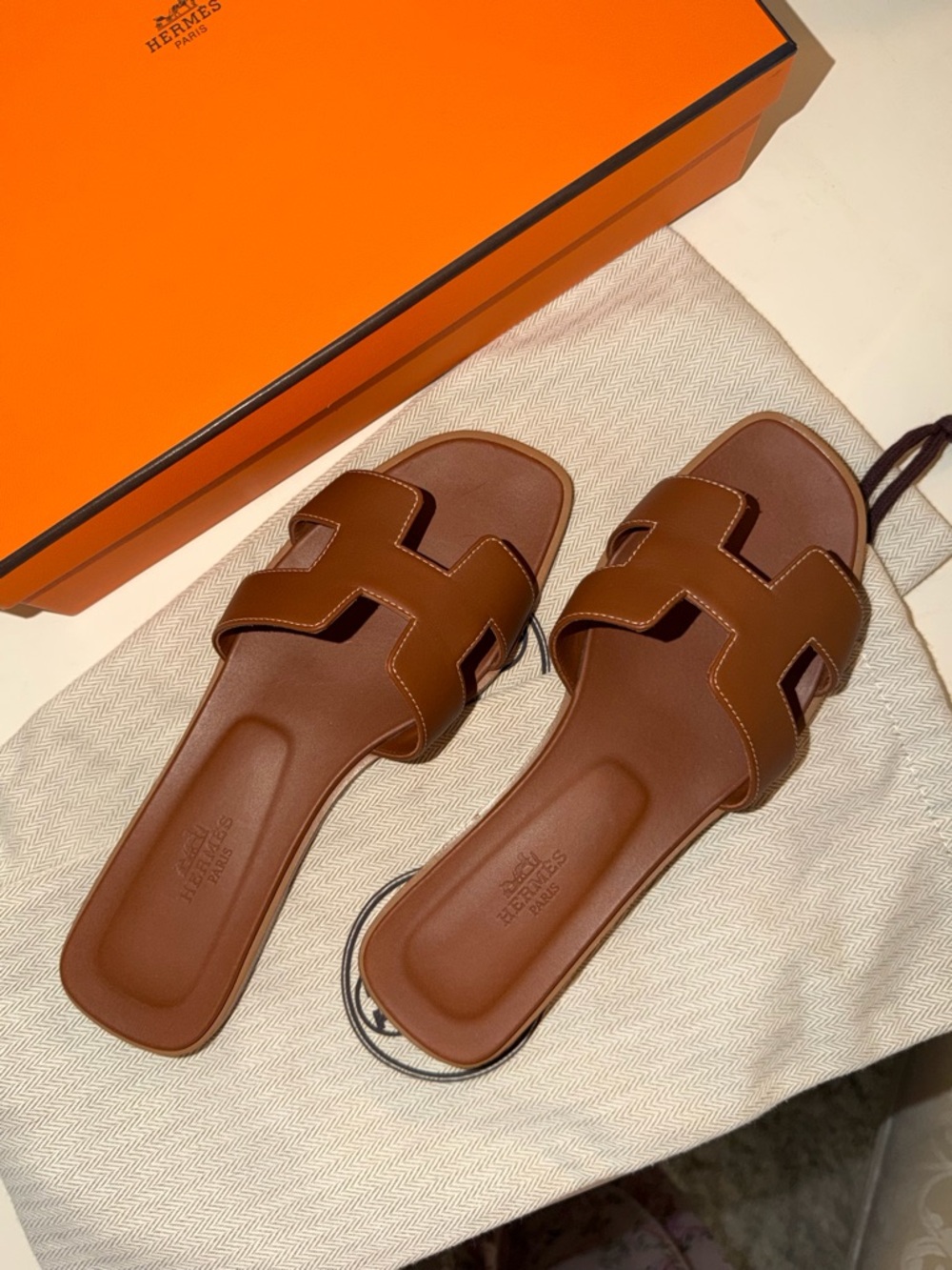 Hermès Oran Sandals in Gold